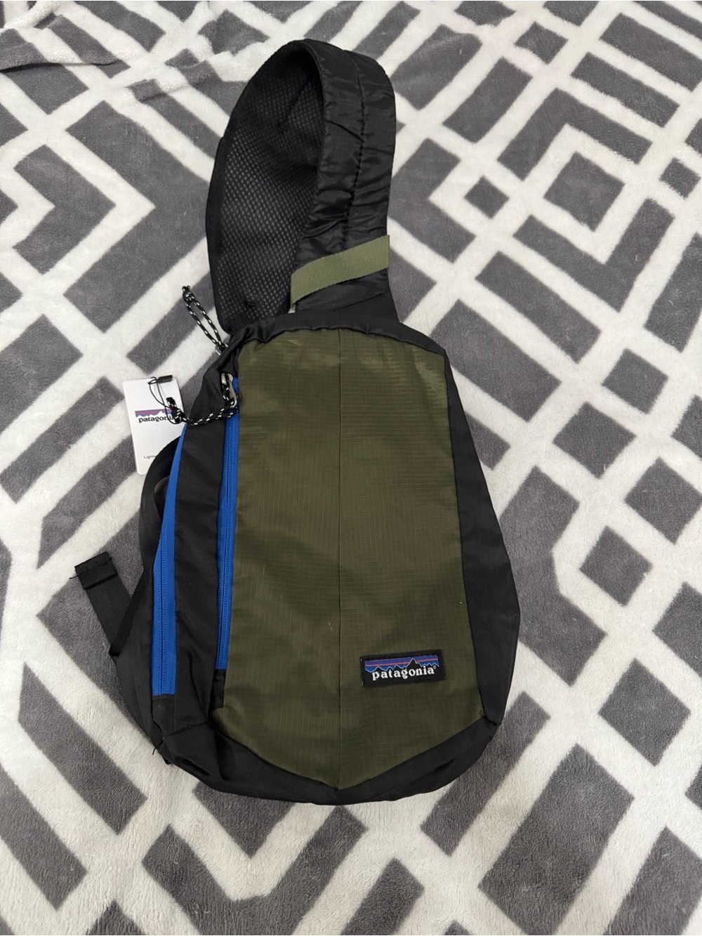 Patagonia Olive Green and Black Sling Bag with Blue Zips
